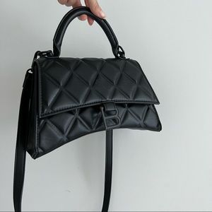 Black B hourglass bag